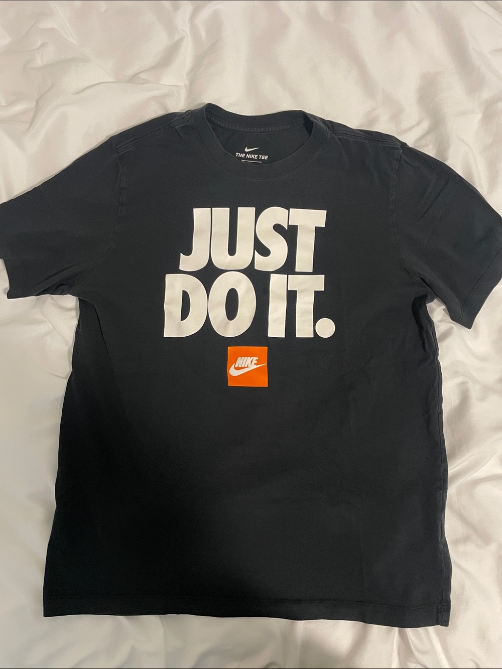 Nike Black Short Sleeve Tee with White 'JUST DO IT.' and Orange Box Logo